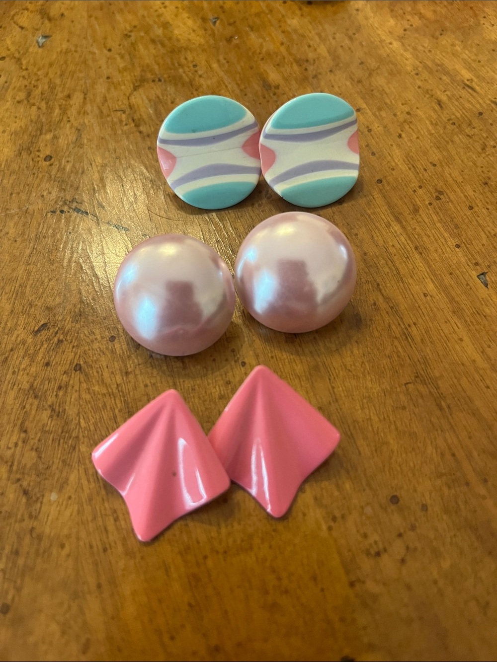 3 pairs of pink themed earrings